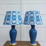 Load image into Gallery viewer, Pair of Mid Century Ceramic Lamps in French Blue with Blue Shirred Ikat Shades
