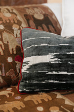 Load image into Gallery viewer, Schumacher Fabric Pillow in Charcoal and Cream with Garnet Velvet Trim
